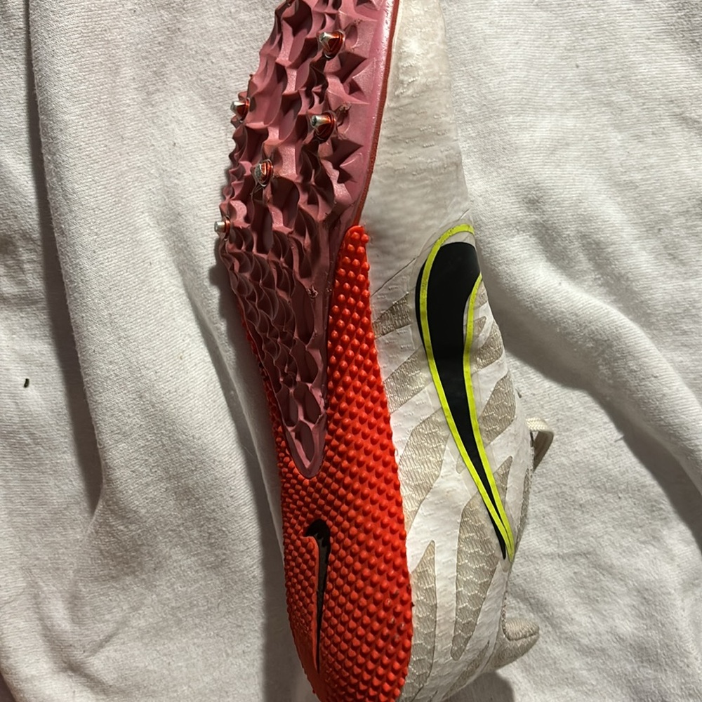 nike track spikes pink white neon